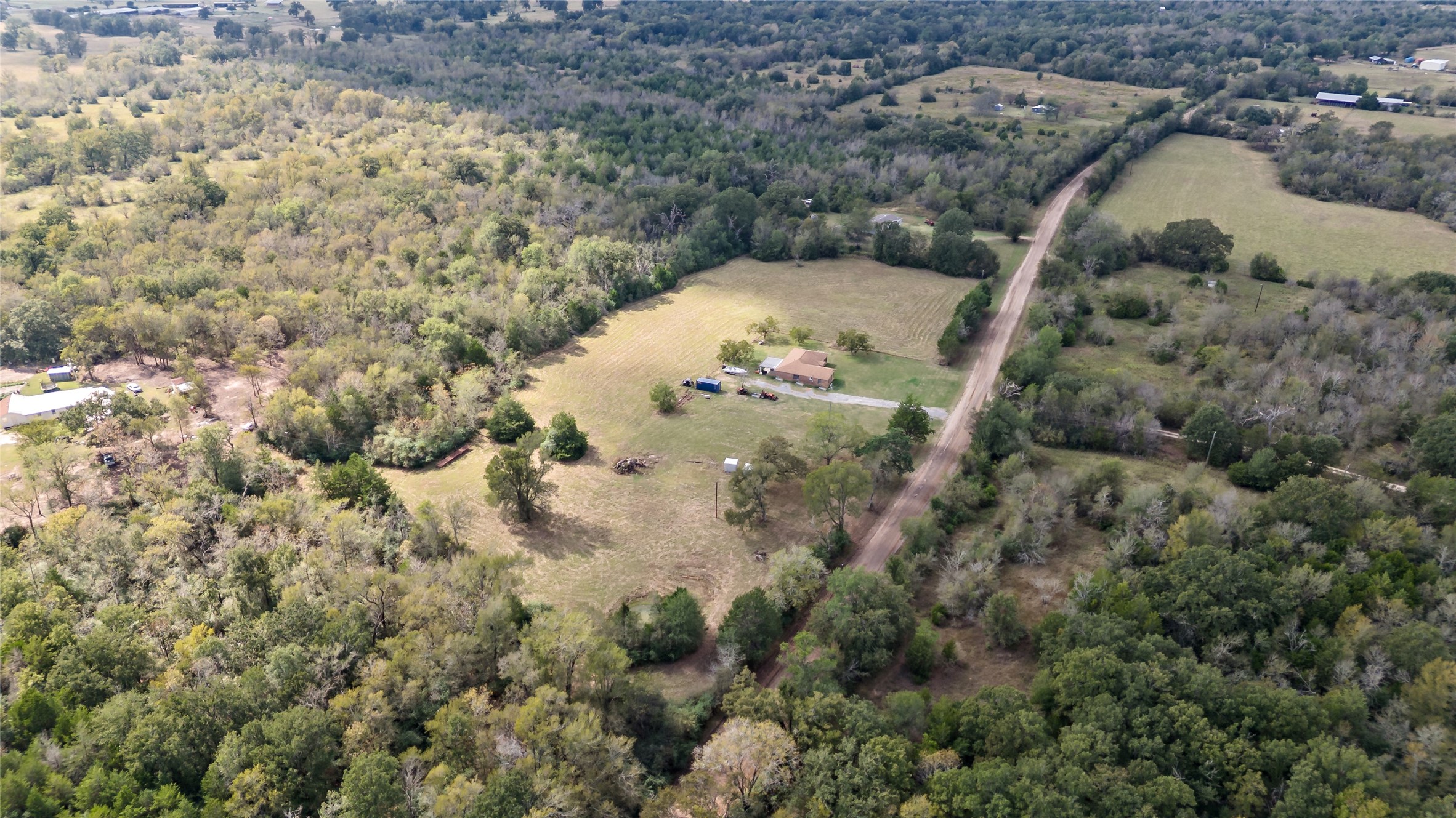 11050 Antioch Road Midway, TX 75852 - Photo 27 of 34 a view of a yard in a forest