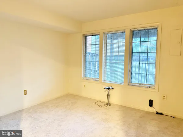 a view of a porch with wooden floor