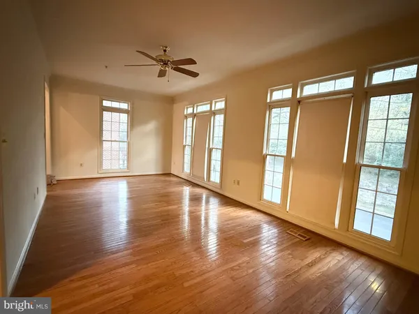 a view of kitchen with wooden floor