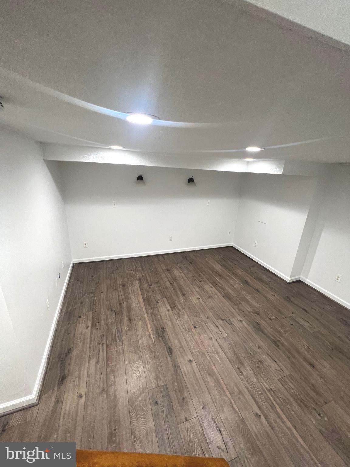 4457 Fenor Road Halethorpe, MD 21227 - Photo 11 of 29 a view of a room with wooden floor