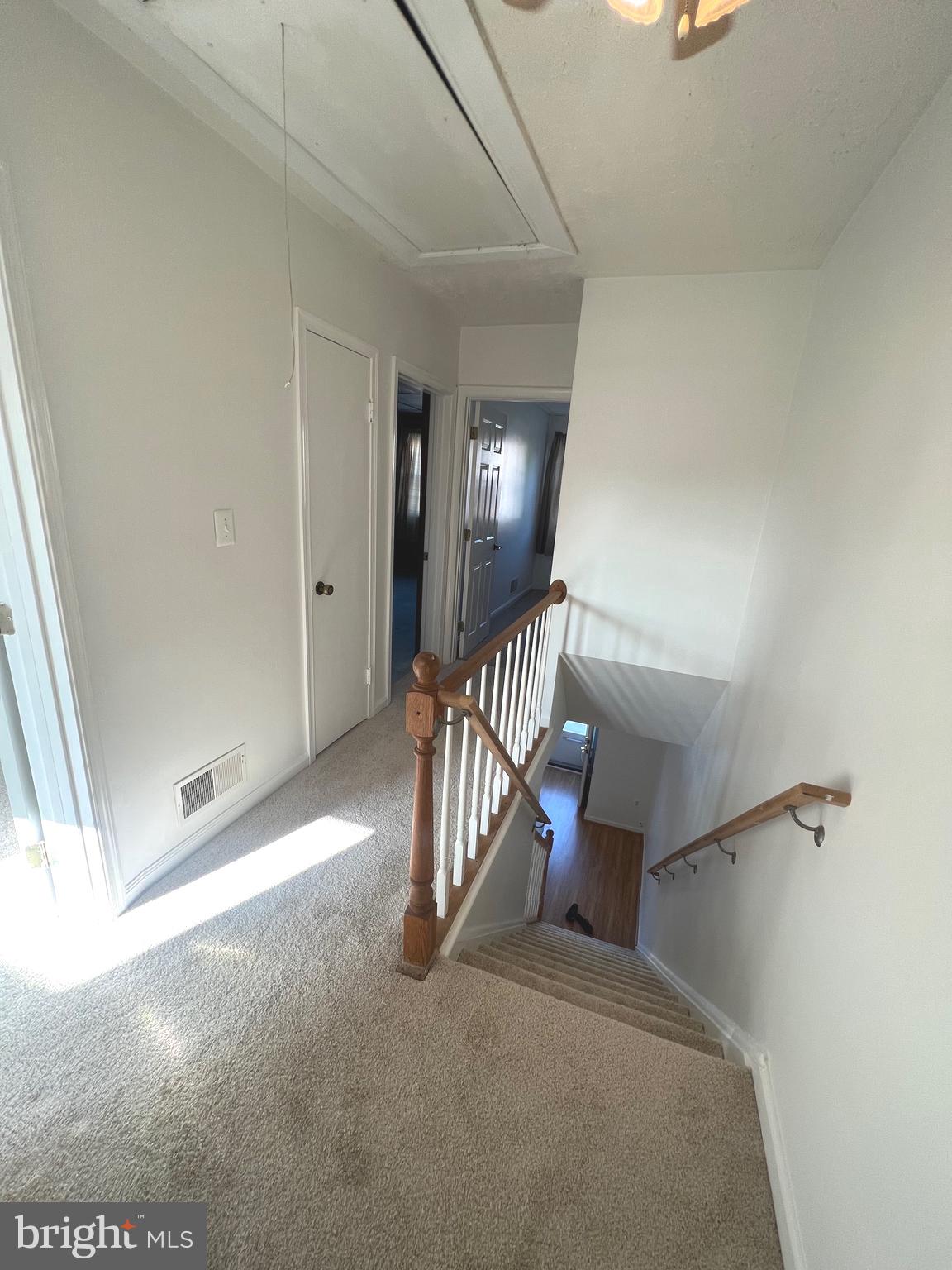 4457 Fenor Road Halethorpe, MD 21227 - Photo 23 of 29 a view of a hallway with staircase