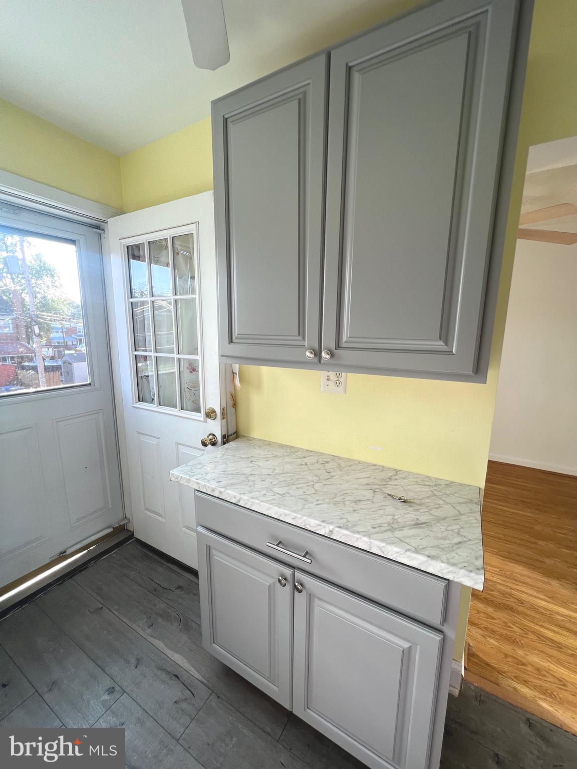 4457 Fenor Road Halethorpe, MD 21227 - Photo 4 of 29 a bathroom with a granite countertop sink and a mirror