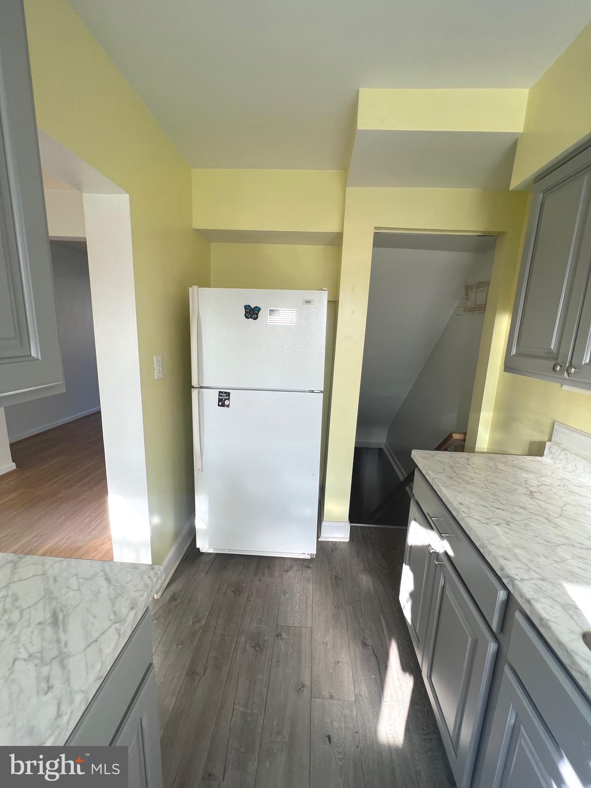 4457 Fenor Road Halethorpe, MD 21227 - Photo 5 of 29 walk in closet with wooden floor washer and dryer