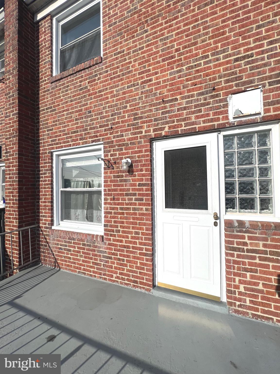 4457 Fenor Road Halethorpe, MD 21227 - Photo 7 of 29 a view of a door of a house with a large window