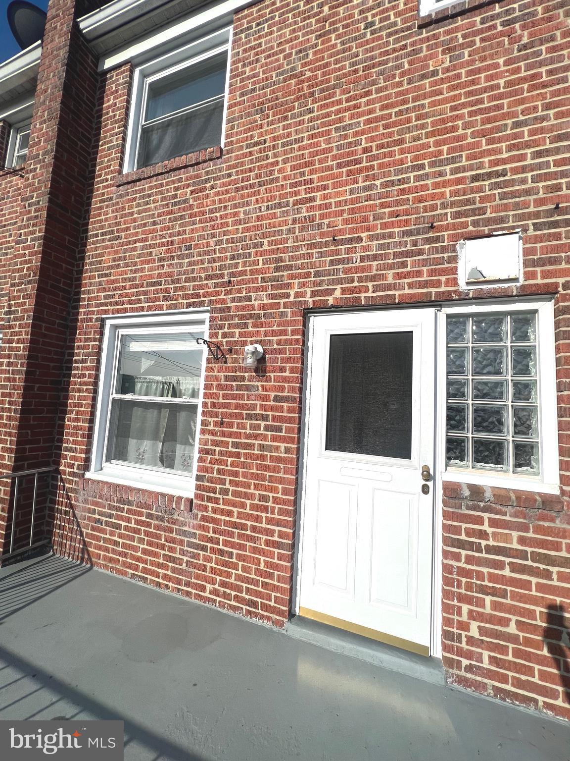 4457 Fenor Road Halethorpe, MD 21227 - Photo 8 of 29 a view of a house with a large window
