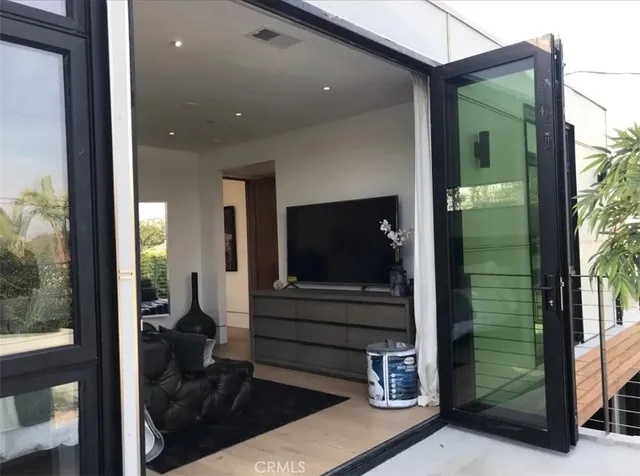 a living room with balcony