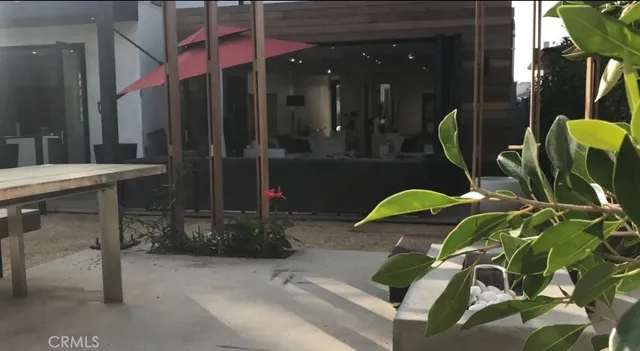 a view of a balcony with chairs