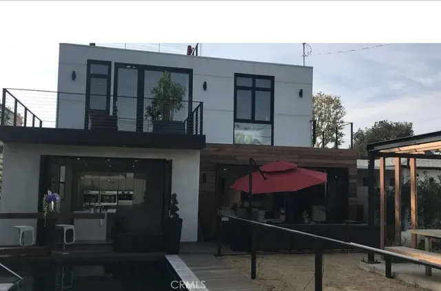 a front view of a house with parking