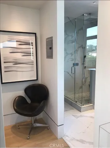 a kitchen with a refrigerator and a sink