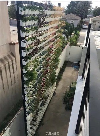 a view of balcony and yard
