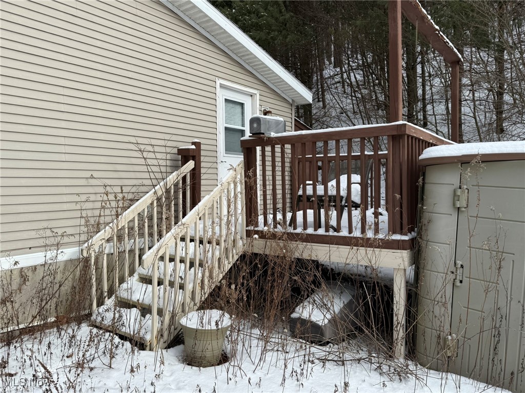 83631 Merryman Road Cadiz, OH 43907 - Photo 10 of 16 View of snow covered deck