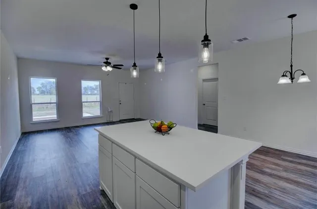 a view of a swimming pool with an outdoor space and seating area