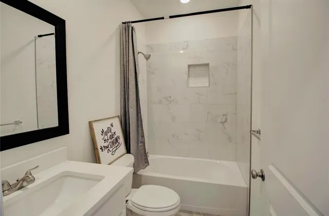 a view of a kitchen island in the center