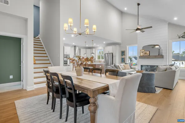 a bedroom with a bed couch and a window