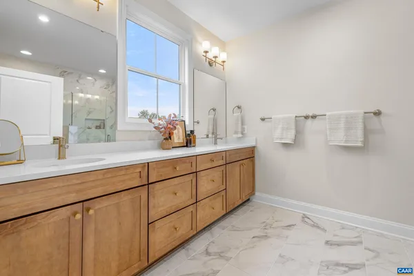 a view of a balcony with chairs and a table