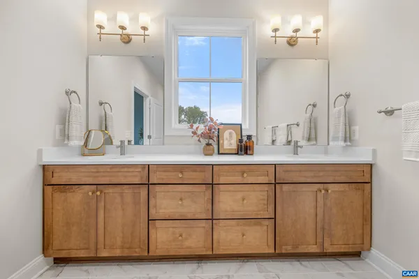 a view of a room with a table and chairs