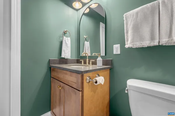 a utility room with sink dryer and washer