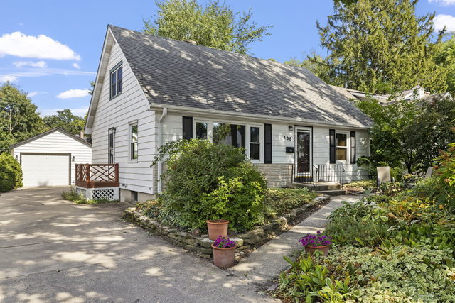 438 South Wright Street Naperville, IL 60540 - Photo 1 of 26 a front view of a house with a yard
