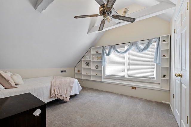 438 South Wright Street Naperville, IL 60540 - Photo 13 of 26 a spacious bedroom with a bed next to a window
