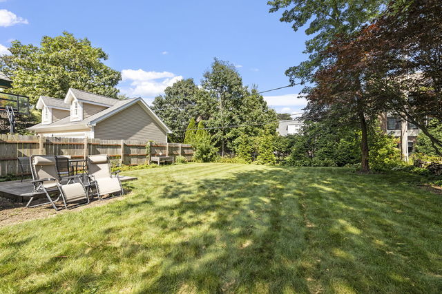 438 South Wright Street Naperville, IL 60540 - Photo 22 of 26 a view of house with garden and trees
