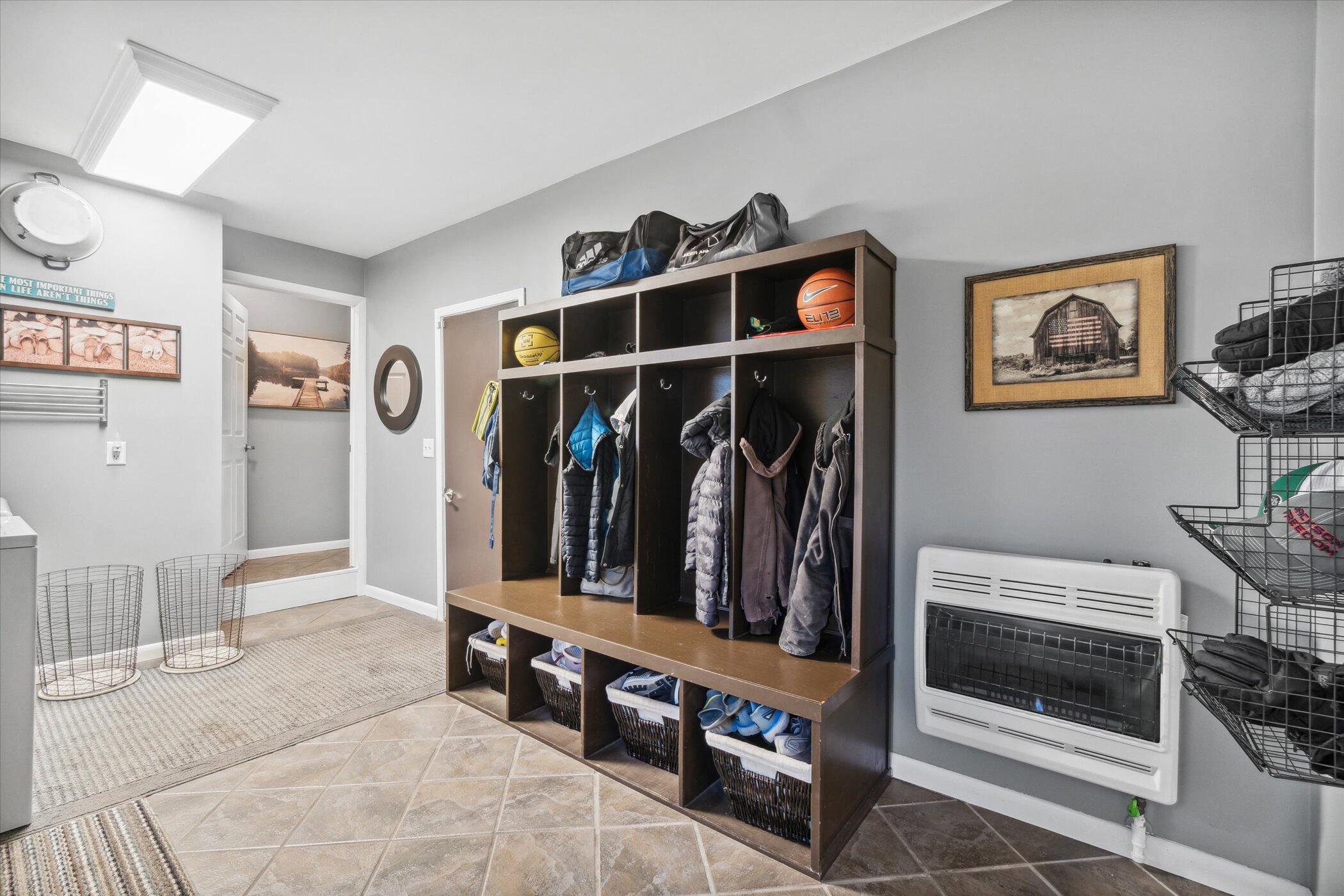 9990 Culver Road Clarklake, MI 49234 - Photo 16 of 42 16-Laundry_mudroom cubbies