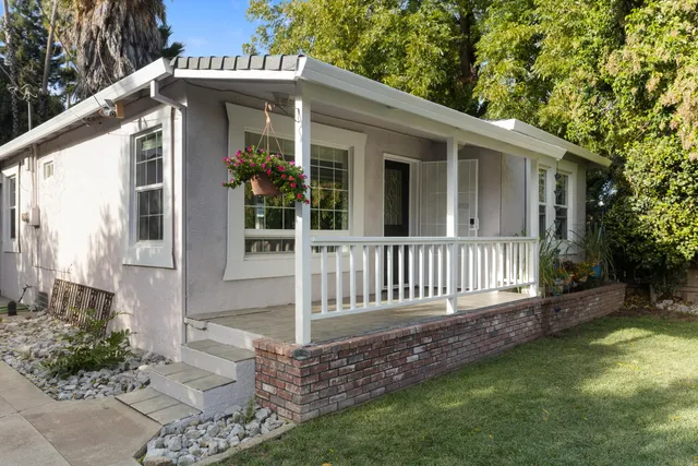 a view of a house with a porch