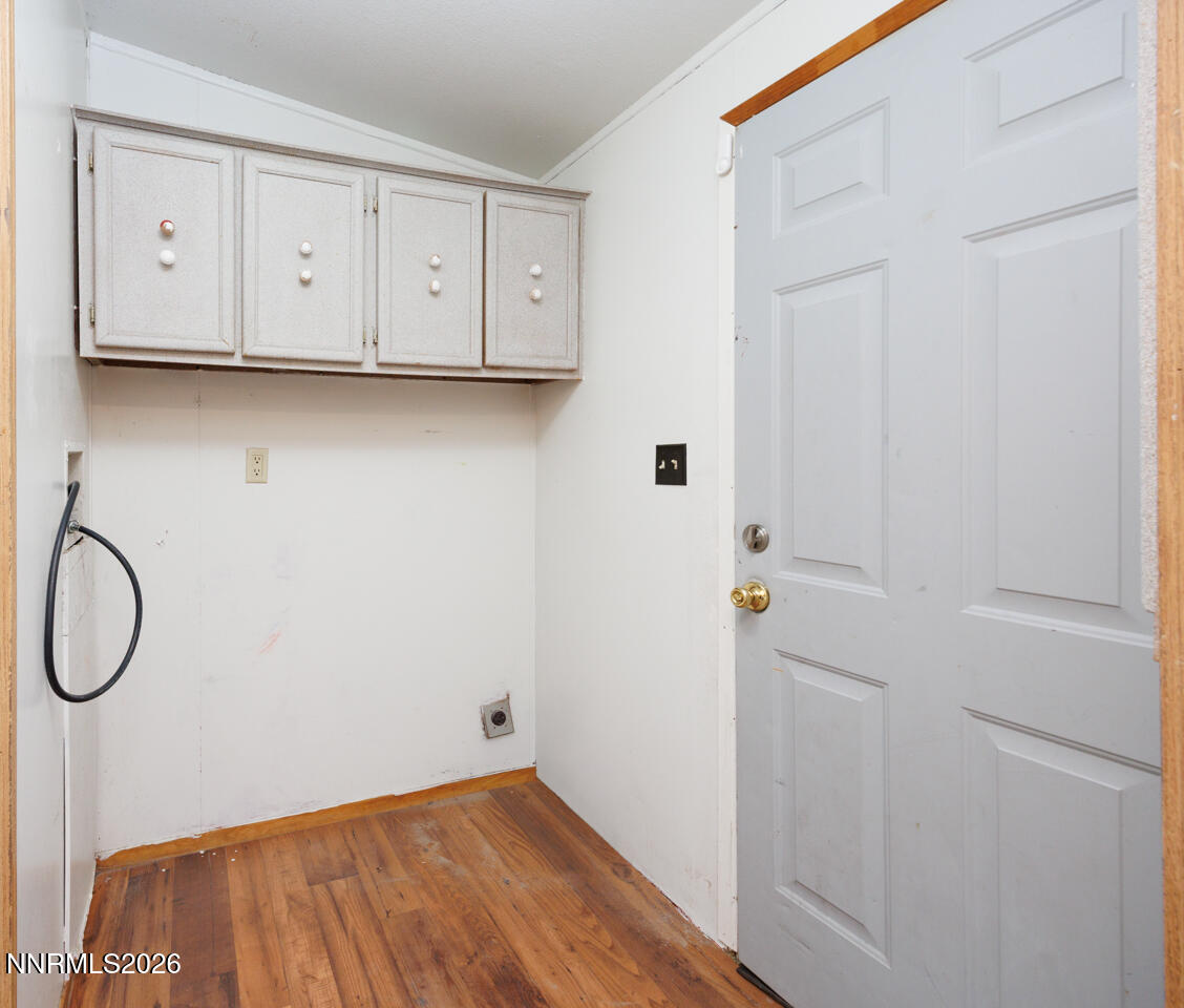 5465 Caleb Drive Fallon, NV 89406 - Photo 3 of 23 a view of a storage and utility room with racks on the wall