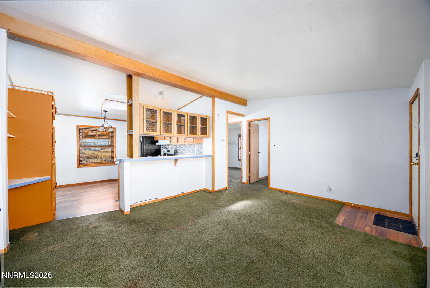 5465 Caleb Drive Fallon, NV 89406 - Photo 4 of 23 a view of an empty room with kitchen