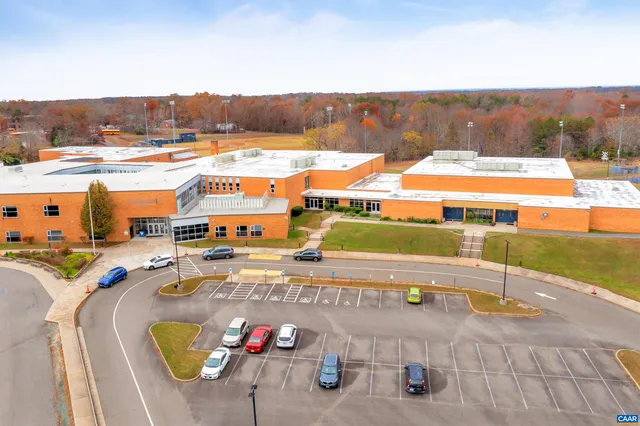 a view of a street with cars
