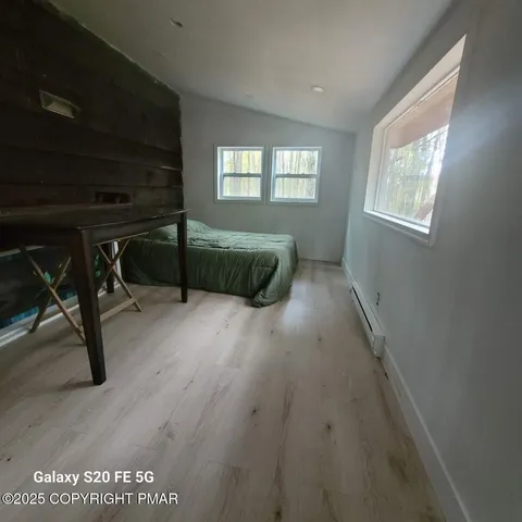 a view of livingroom with furniture and windows