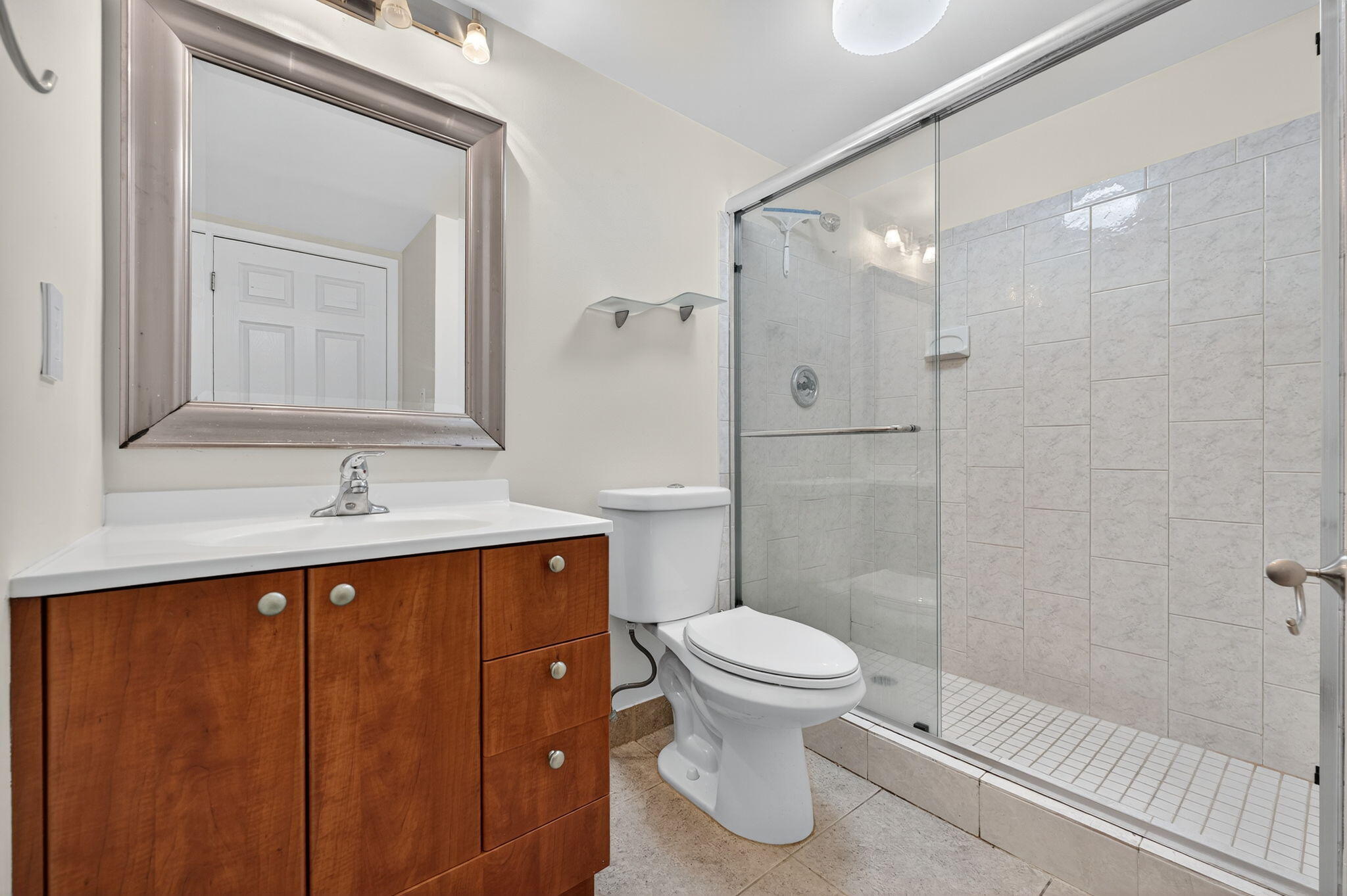 9441 West McNab Road, Unit 111 Tamarac, FL 33321 - Photo 17 of 27 Master Bathroom