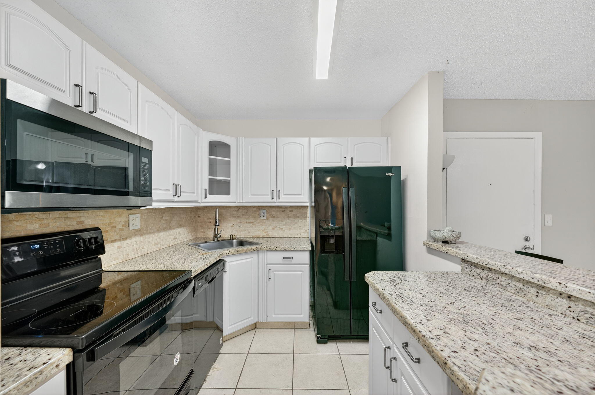 9441 West McNab Road, Unit 111 Tamarac, FL 33321 - Photo 10 of 27 Kitchen