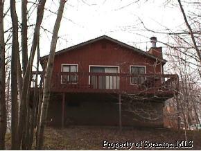 1590 Ridgeview Drive Lake Ariel, PA 18436 - Photo 1 of 1 a front view of a house with balcony