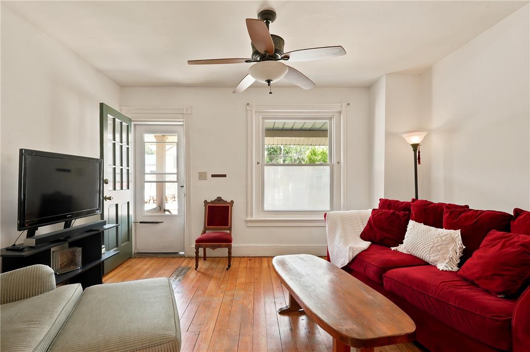 803 Spring Street Bethlehem, PA 18018 - Photo 4 of 34 Bright hardwood floors and classic trim frame a welcoming living space.