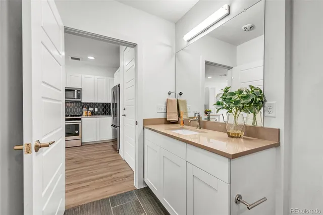 a view of a balcony with furniture