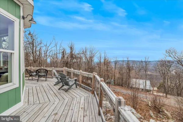 a view of a balcony with mountain view