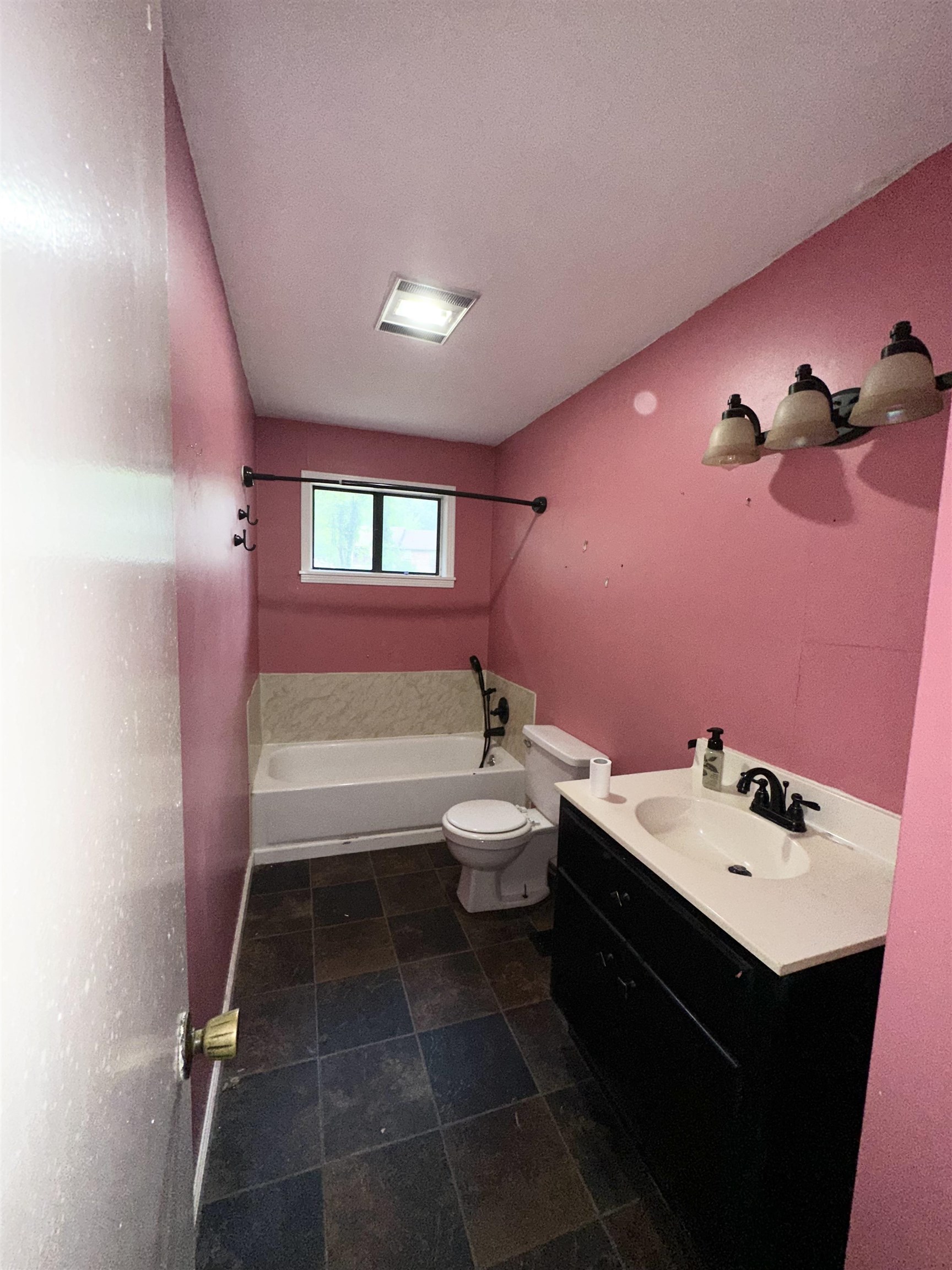 53 Crabtree Road Selmer, TN 38375 - Photo 12 of 28 Full bathroom featuring vanity, shower combination, and a textured ceiling