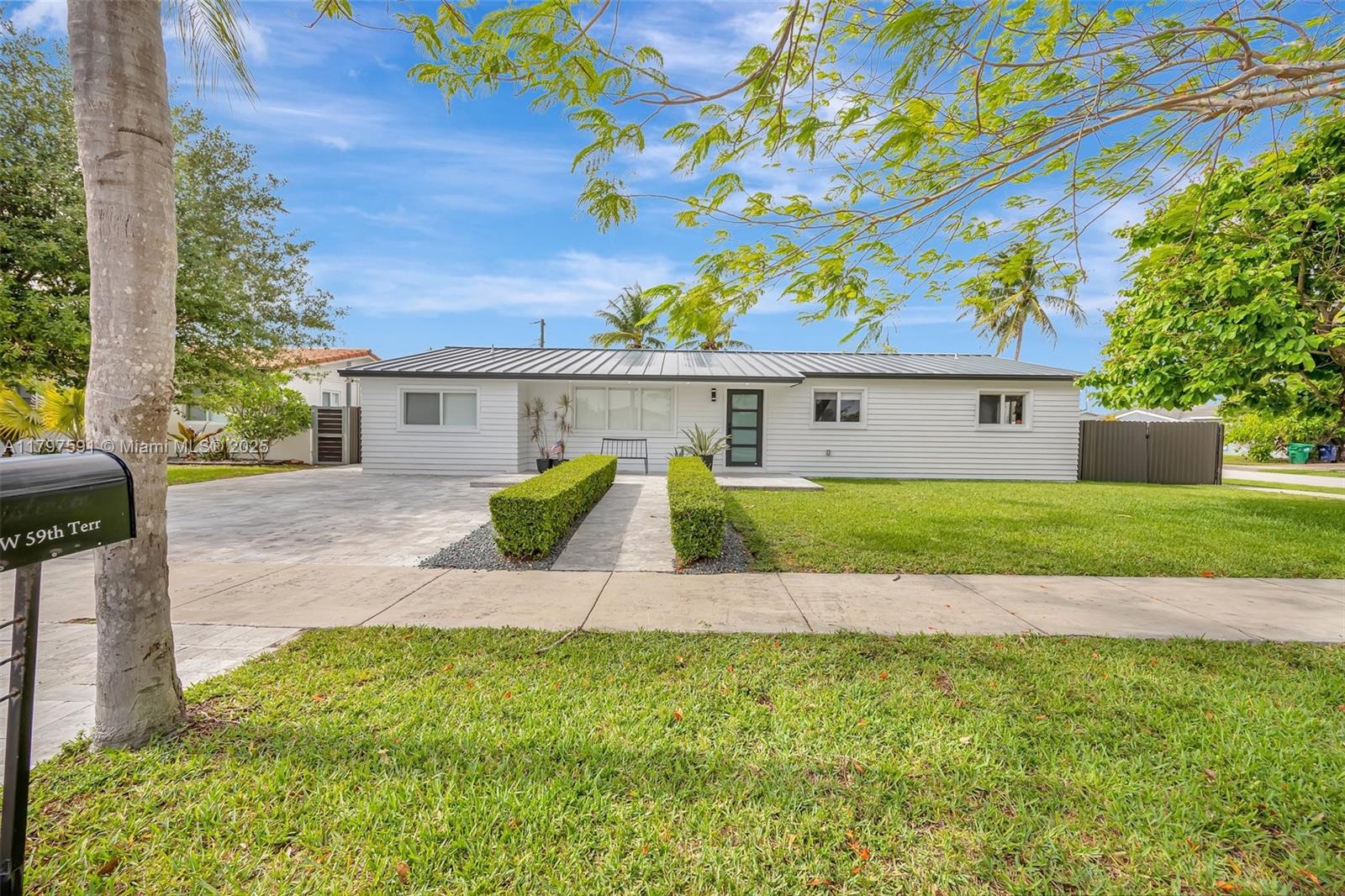 a view of house with outdoor space and entertaining space