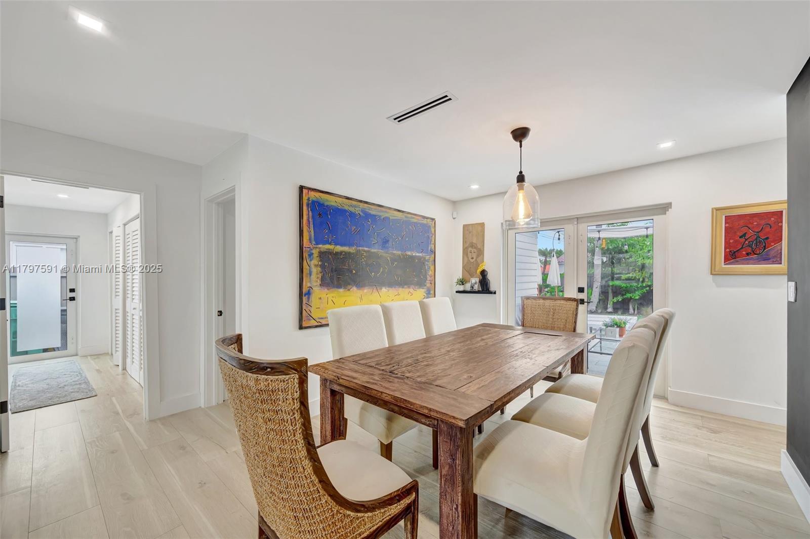 9547 Southwest 59th Terrace Miami, FL 33173 - Photo 11 of 51 a view of a dining room with furniture