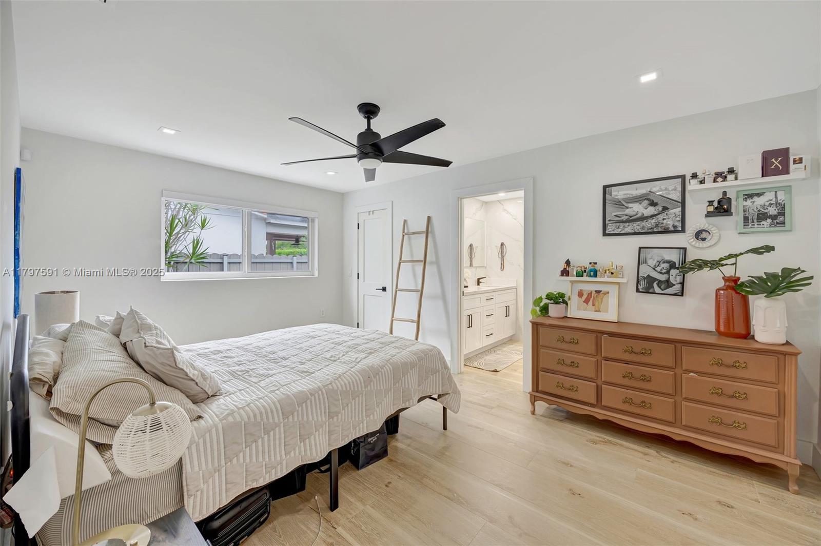 9547 Southwest 59th Terrace Miami, FL 33173 - Photo 18 of 51 a living room with furniture and wooden floor
