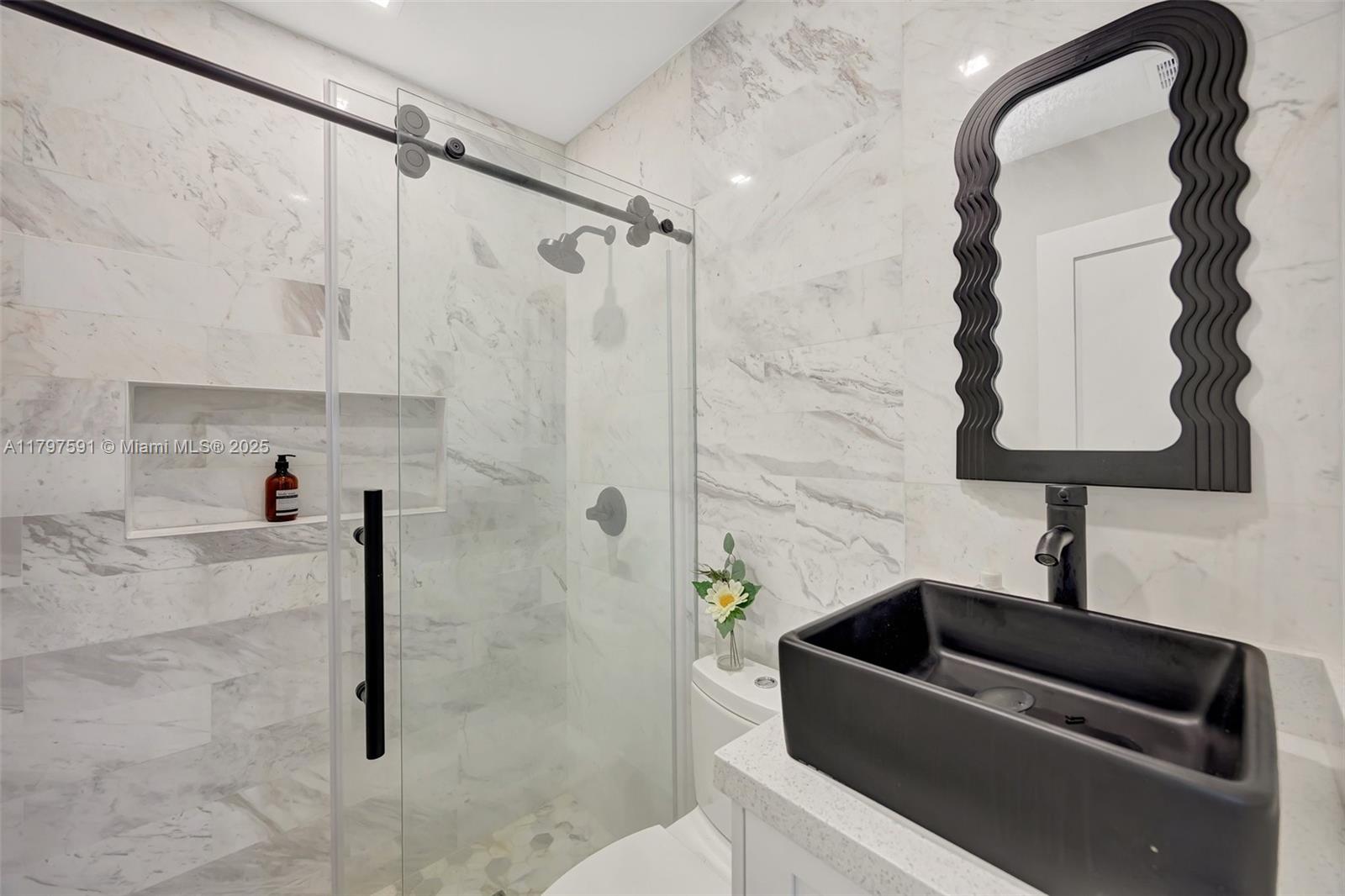 9547 Southwest 59th Terrace Miami, FL 33173 - Photo 28 of 51 a bathroom with a shower