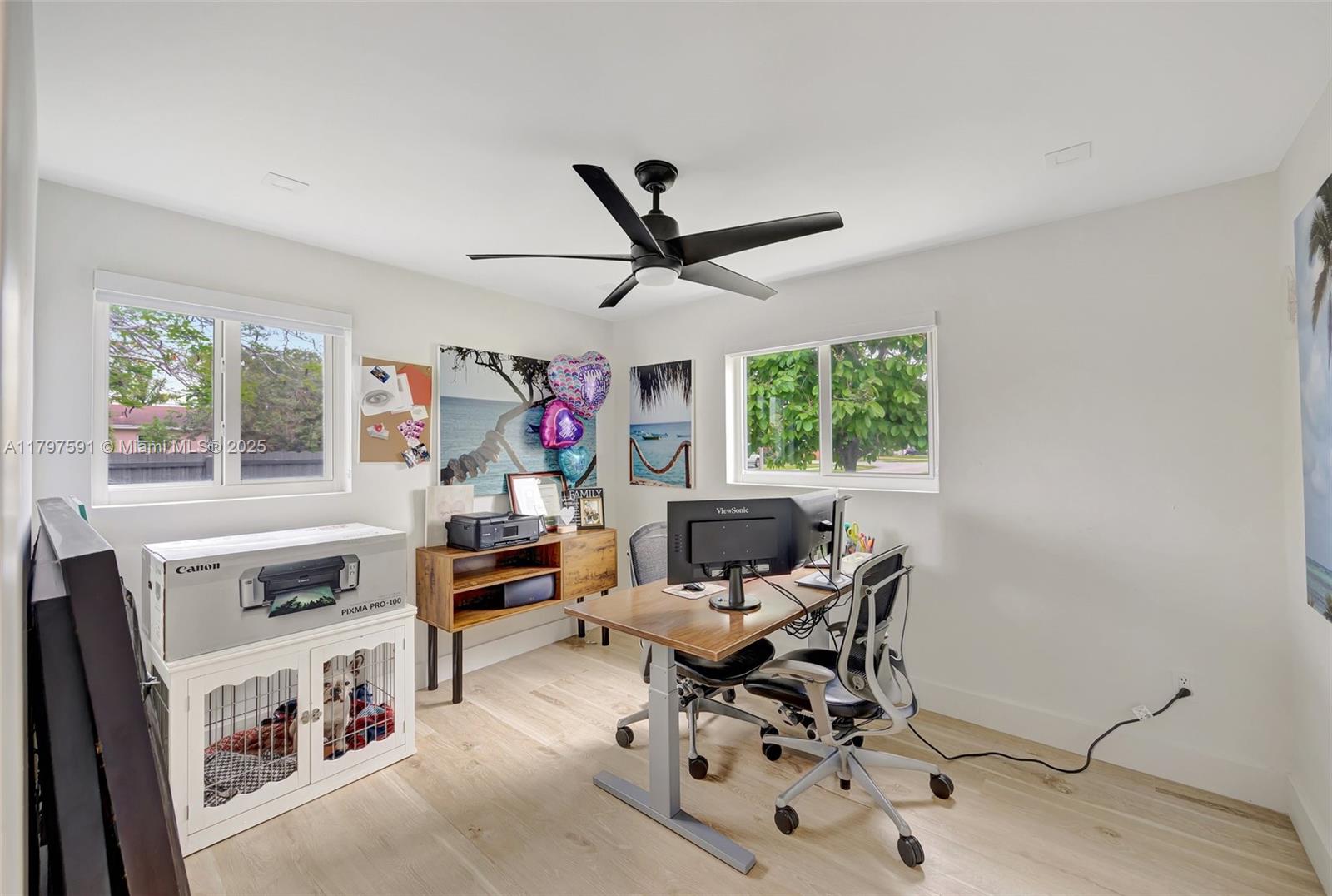 9547 Southwest 59th Terrace Miami, FL 33173 - Photo 37 of 51 a living room with furniture and a flat screen tv