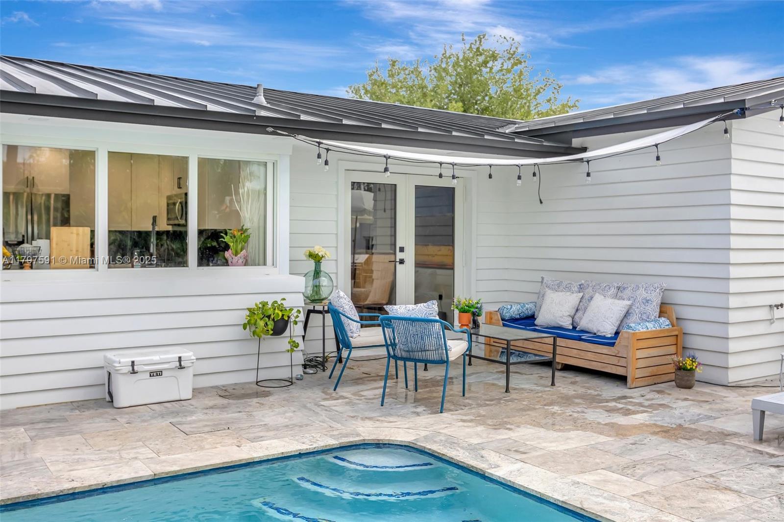 9547 Southwest 59th Terrace Miami, FL 33173 - Photo 38 of 51 a view of patio with chairs and a table