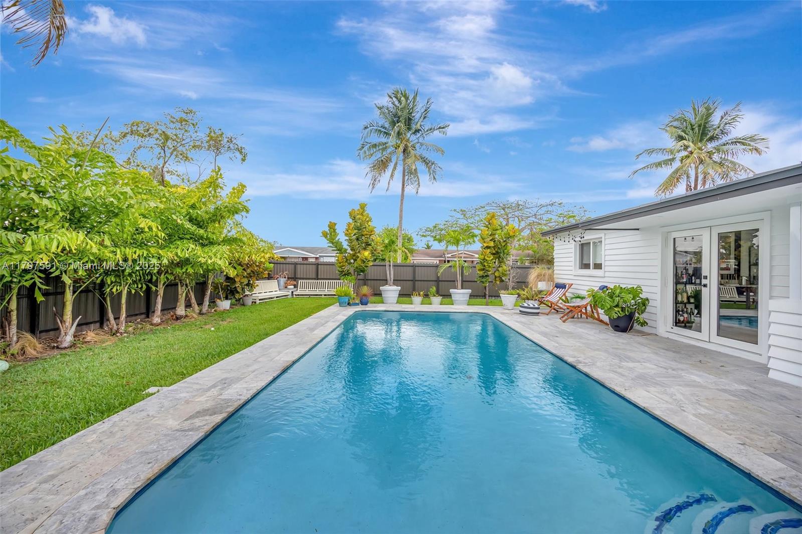 9547 Southwest 59th Terrace Miami, FL 33173 - Photo 42 of 51 a view of a house with a yard
