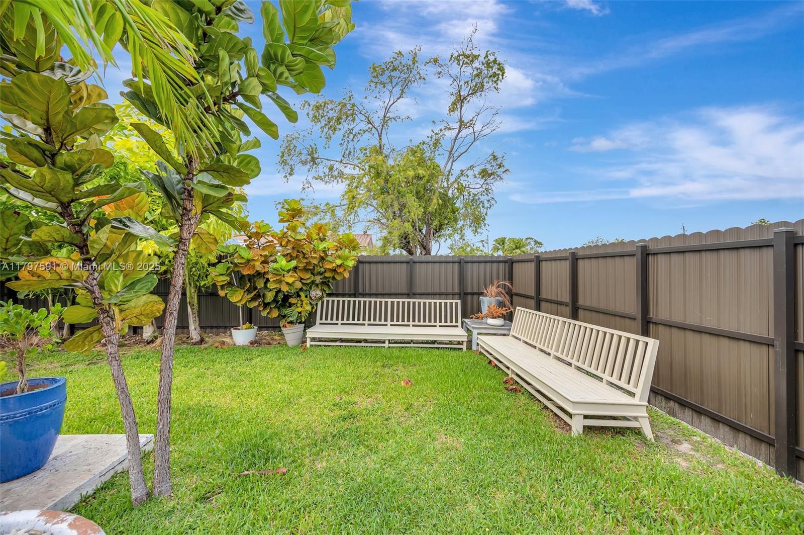 9547 Southwest 59th Terrace Miami, FL 33173 - Photo 44 of 51 a view of a backyard with a garden