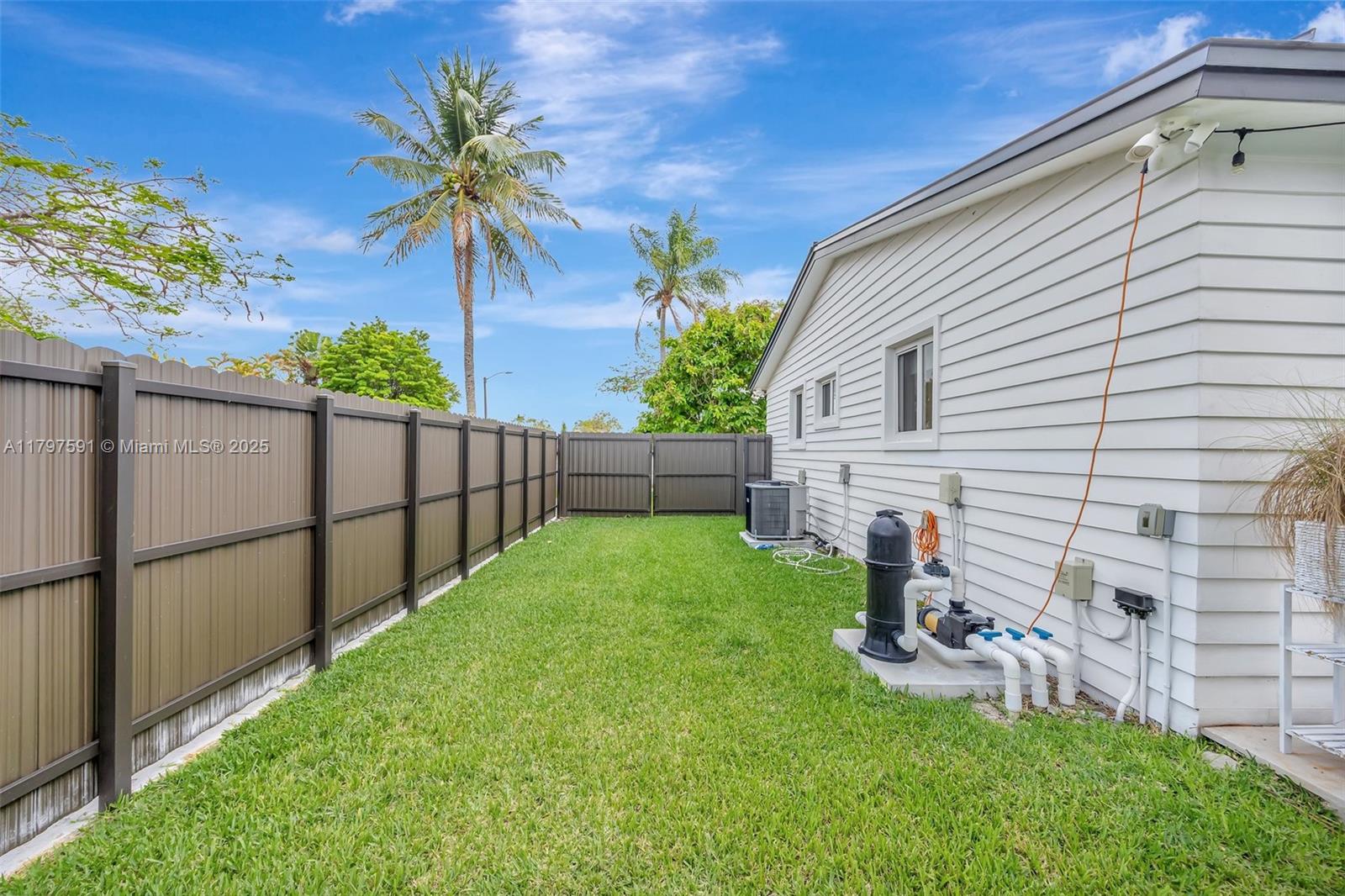 9547 Southwest 59th Terrace Miami, FL 33173 - Photo 47 of 51 a view of a backyard with a garden