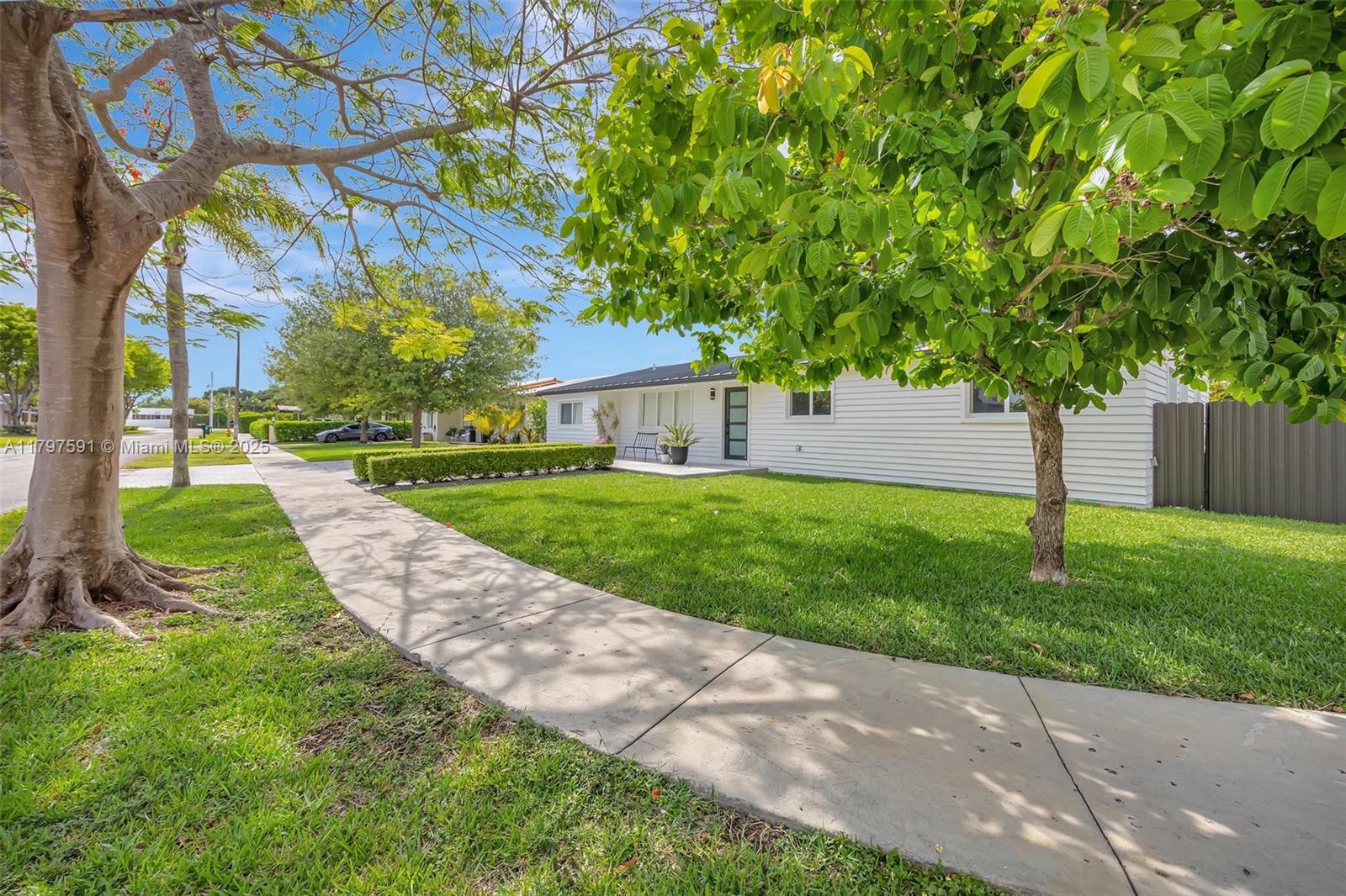 9547 Southwest 59th Terrace Miami, FL 33173 - Photo 50 of 51 a view of a house with a yard