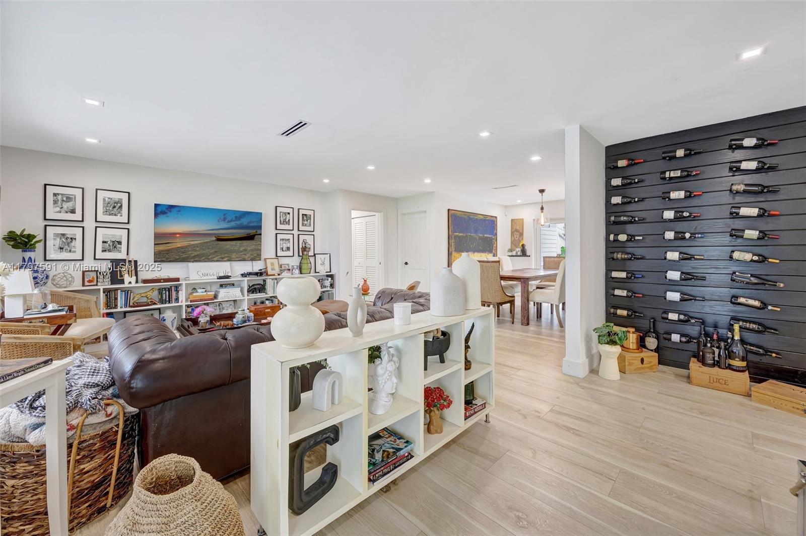 9547 Southwest 59th Terrace Miami, FL 33173 - Photo 5 of 51 a living room with furniture and a flat screen tv