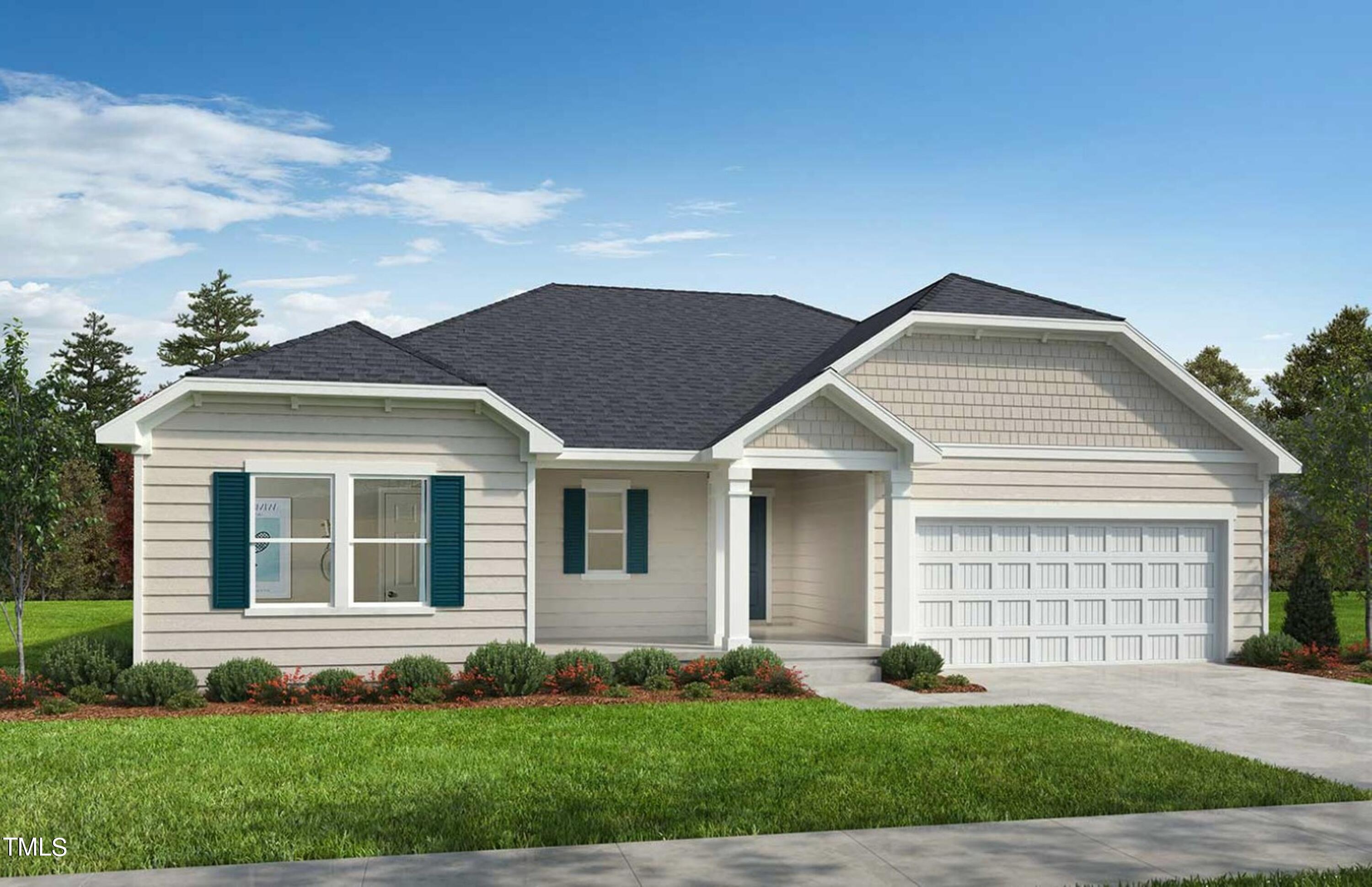 7652 Redwood Rdg Way Willow Spring, NC 27592 - Photo 1 of 12 a front view of a house with a yard and garage