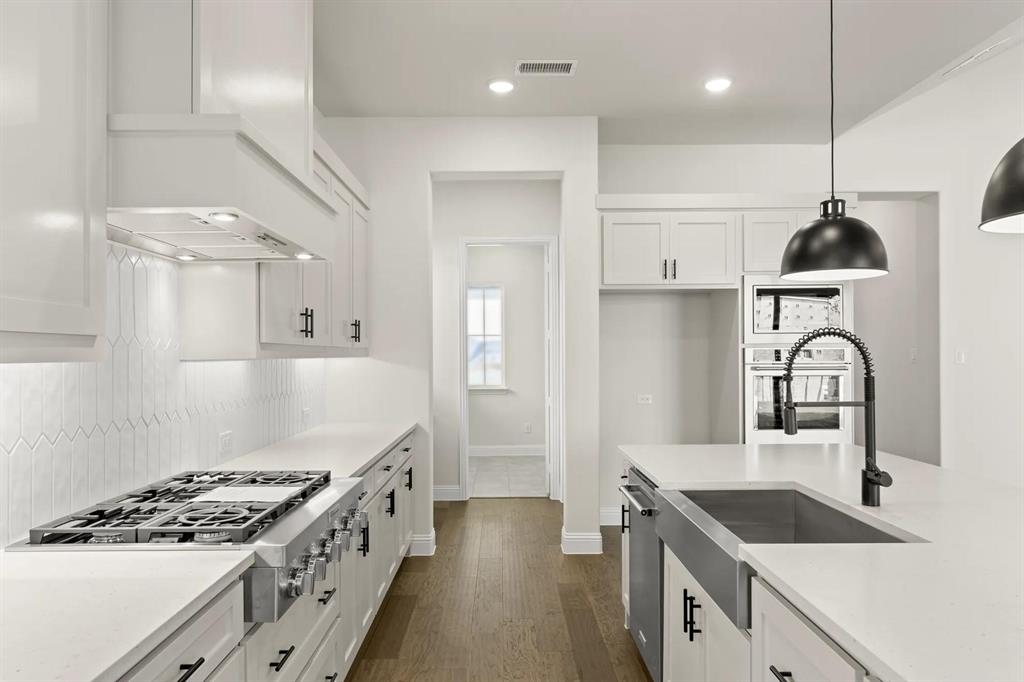 3304 Andesite Road McKinney, TX 75071 - Photo 7 of 29 The Brayden G Kitchen